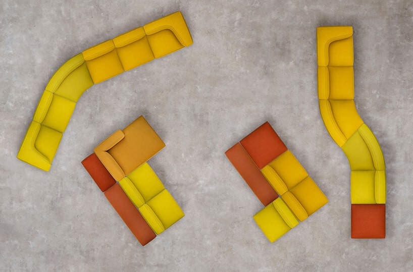żółto musztardowe kanapy z dodatkiem materiału w kolorze lekkie czerwieni