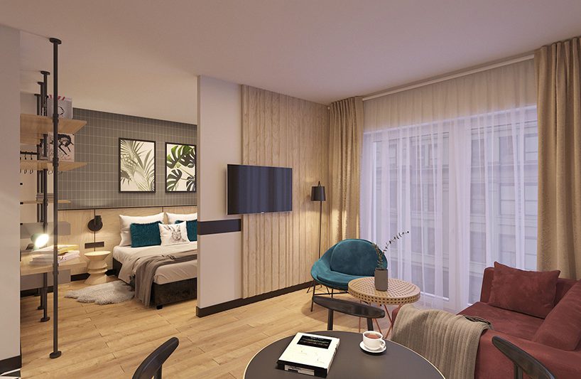 pokój hotelowy w jasnym brązie z łóżkiem w tle