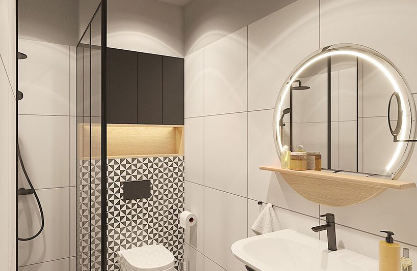 jasna łazienka w hotelu z prysznicem