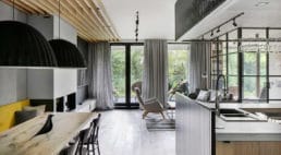 połączenie betonu, zieleni i nowoczesnego designu w domu w pobliżu warszawy