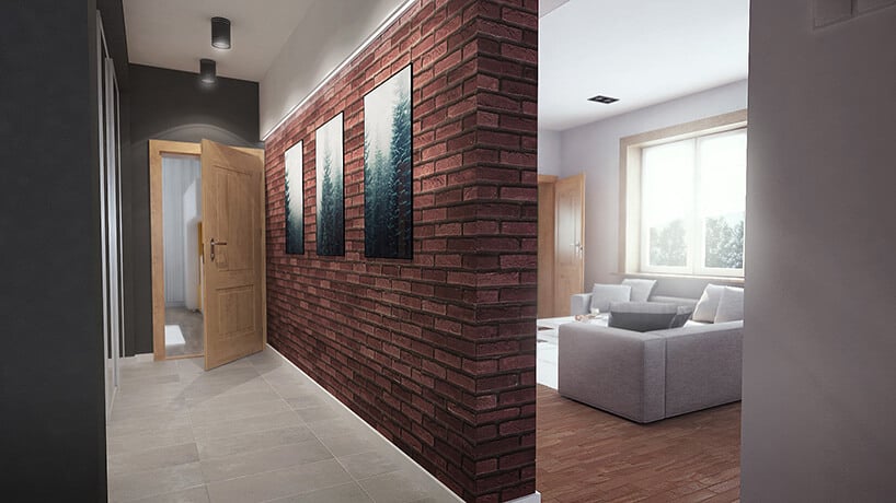 przedpokój inspiracje - duża ściana z czerwonej cegły w korytarzu