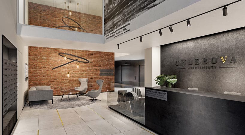 nowoczesny apartamentowiec Chlebova w Gdańsku elegancka recepcja z czarnego kamienia na tle białych ścian z ceglanymi elementami