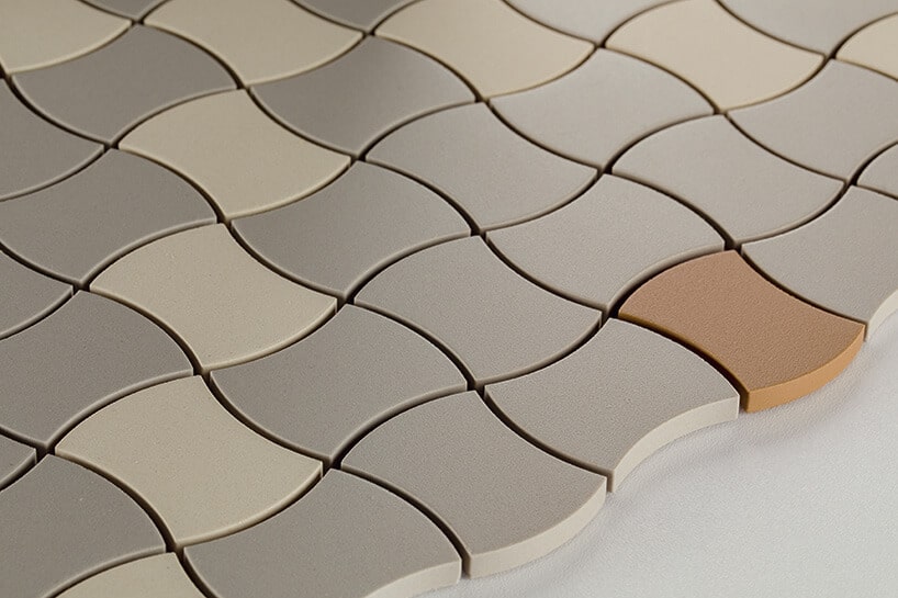 ceramiczne płytki o za okrąglonym kształcie w kolorze szarości i beżu
