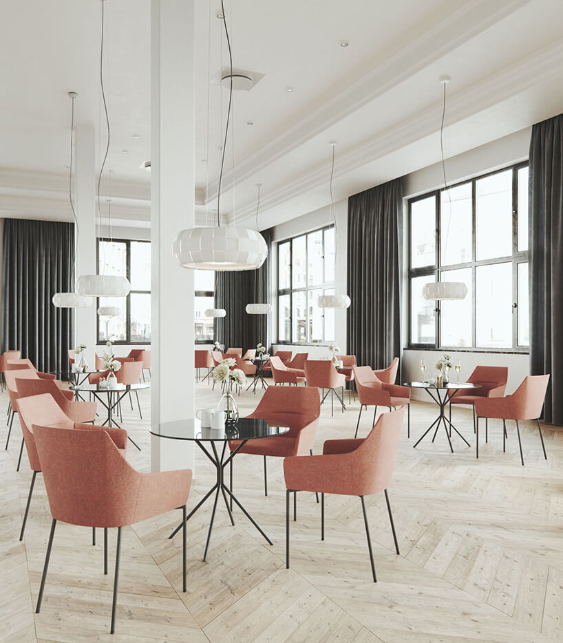 łososwe fotele przy stolikach w restauracji