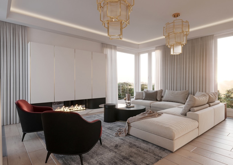 wnętrze eleganckiego apartamentu dwa złote żyrandole nad jasną narożną sofą