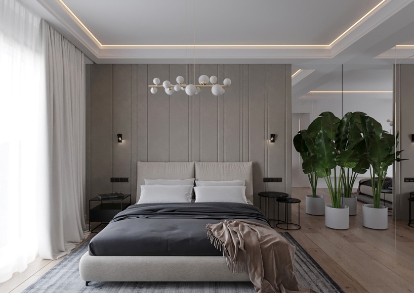 wnętrze eleganckiego apartamentu sypialnia z szarą ścianą