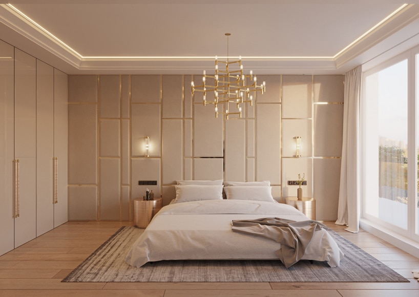 wnętrze eleganckiego apartamentu beżowa sypialnia z dużym łózkiem pod złotym żyrandolem