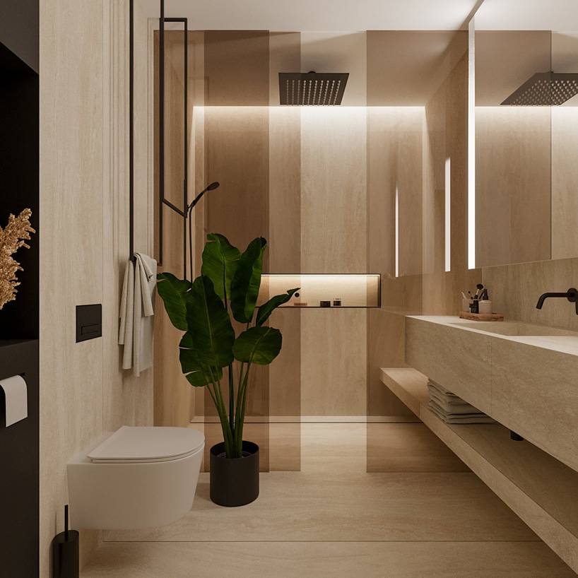 wnętrze eleganckiego apartamentu beżowa łazienka z prysznicem za dymioną szybą
