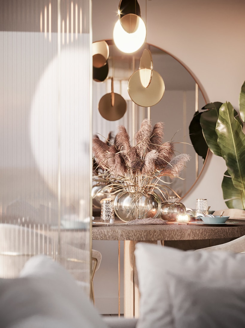 wnętrze eleganckiego apartamentu wyjątkowy okrągły stół pod wyjątkowym żyrandolem z błyszczących elementów