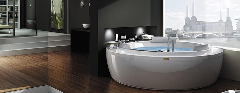duże okrągłe jacuzzi w przestronnej łazience