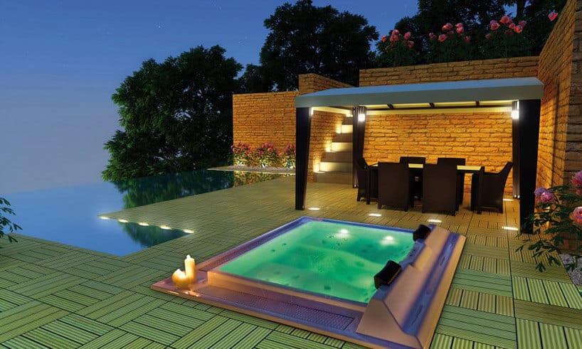 oświetlone jacuzzi na tarasie letniej rezydencji