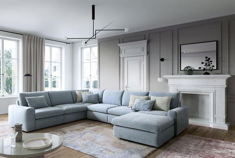 duża jasnoniebieska sofa w przestronnym salonie
