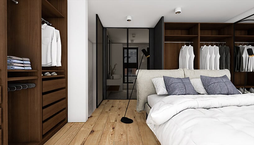 duża przestrzeń na szafy w sypialni z deskami na podłodze