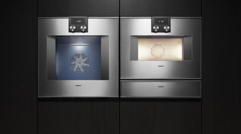 srebrne ekskluzywne eleganckie nowoczesne piekarniki Gaggenau w czarnej zabudowie