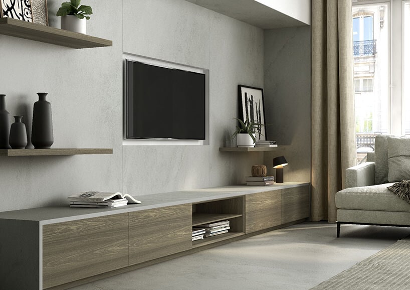 nowoczesny salon ze ścianą wykończoną szarym kamieniem od Cosentino wokół telewizora