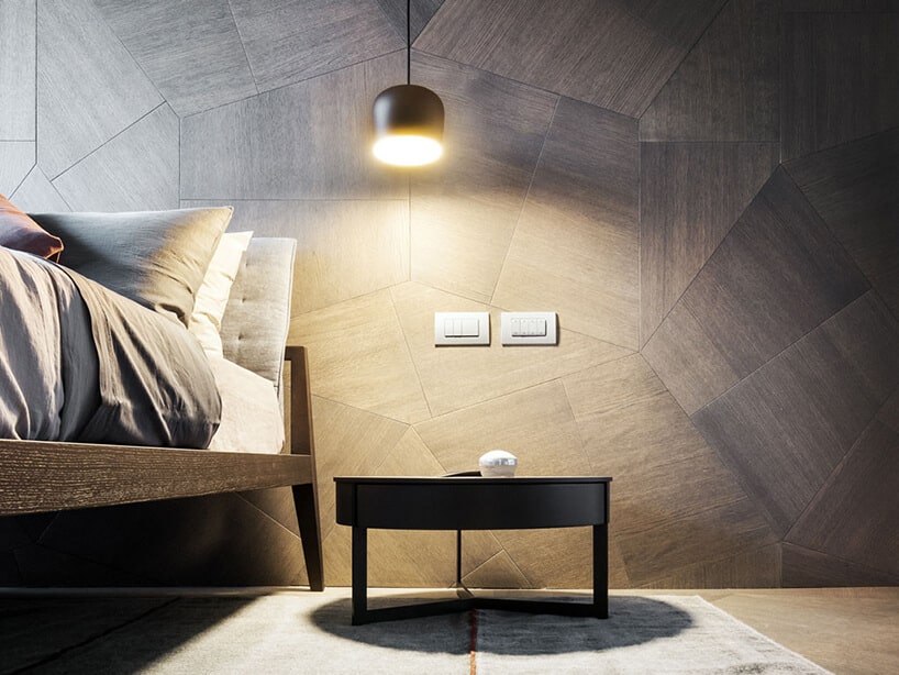 elegancki penthouse od Zaha Hadid zdjęcie małe stolika przy łóżki na tle ściany z drewnianych nieregularnych desek