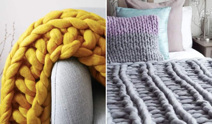 zestawienie kocy Chunky Knit od Joules żółty z grubej włóczki przewieszony przez szare oparcie fotela i szary rozłożony na łóżku