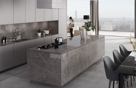 nowoczesna szara kuchnia z dużą wyspą z kamienia Dekton Korso z kolekcji Stonika od Cosentino