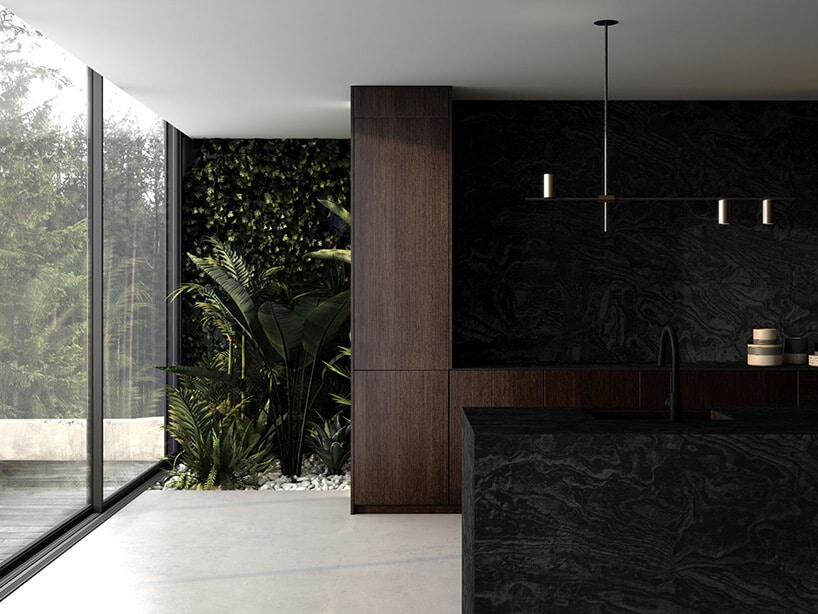 wnętrze nowoczesnego domu z białą podłogą oraz ciemno brązowymi meblami z czarnymi dodatkami