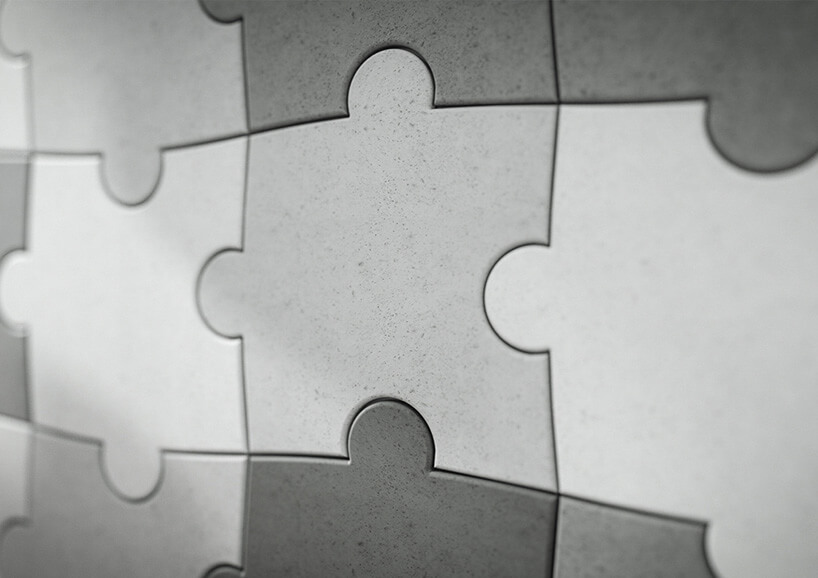 płytki puzzle 3D ułożone na ścianie